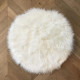 FLOKATI DELUXE Tapis de salon ou chambre - Peau de mouton synthétique - Ø 70 cm - Blanc acrylique