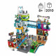 LEGO City 60380 Le Centre-Ville, Jouet de Maquettes avec Salon de Coiffure, Vétérinaire, et Hôtel