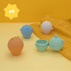 Badabulle Lot de 4 Aspergeurs de bain - Jouets de Bain en Silicone Souple - S'ouvrent pour etre lavés